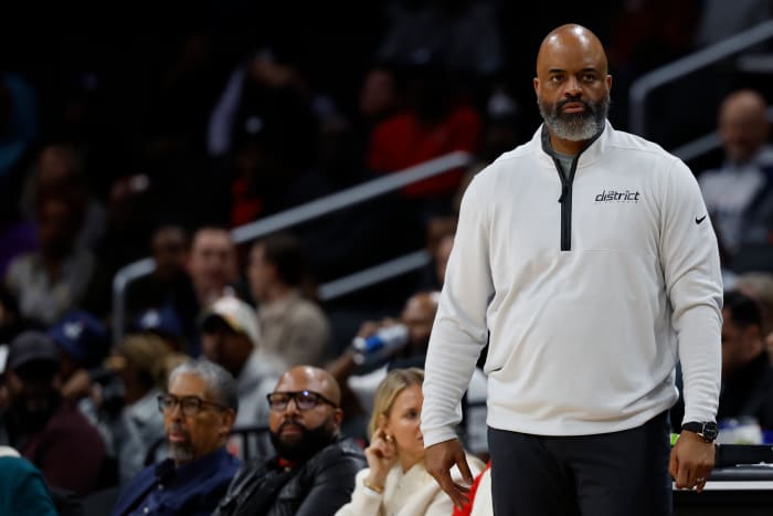 Washington Wizards head coach Wes Unseld Jr. looks on from the bench against the Philadelphia 76ers in the second quarter at Capital One Arena.